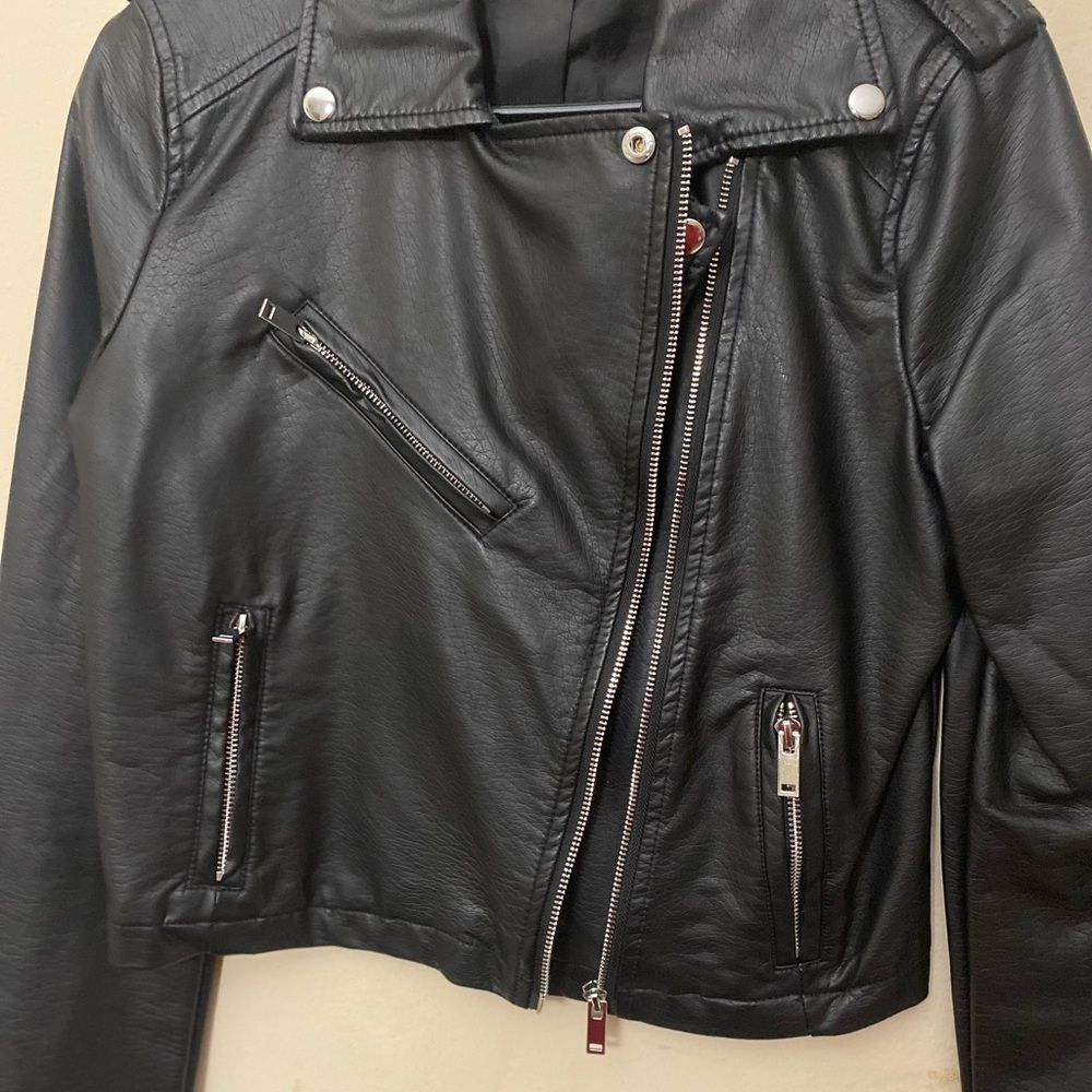 Leather Jacket from Charlotte Russe. Never worn and the size is medium.
